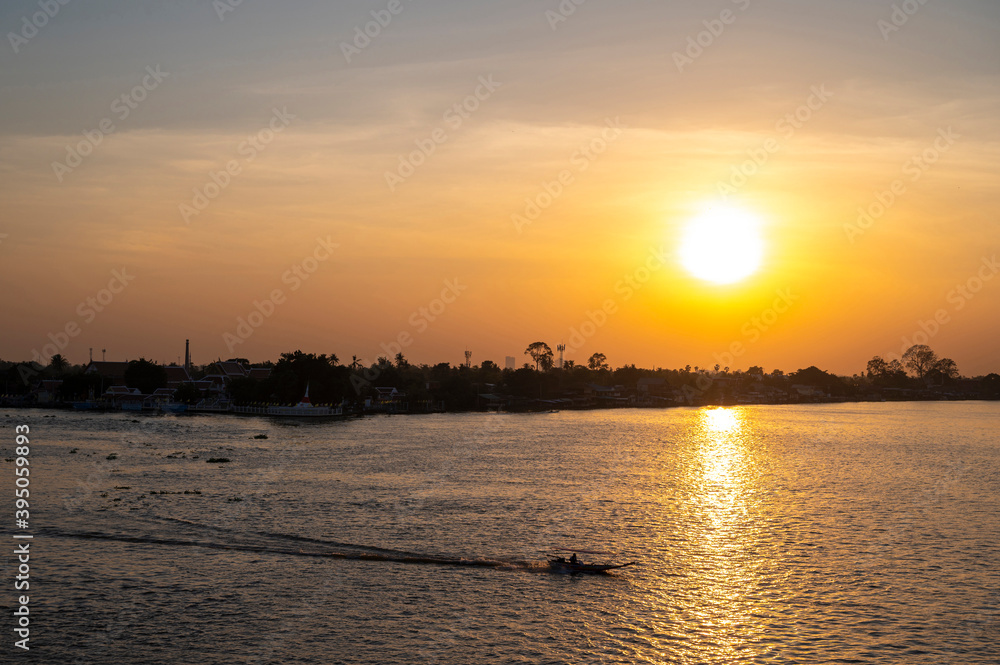 Beautiful Sunset View of Koh Kred at Rama IV bridge cross the Chao Phraya River in Park Kred, Nonthaburi province, Thailand