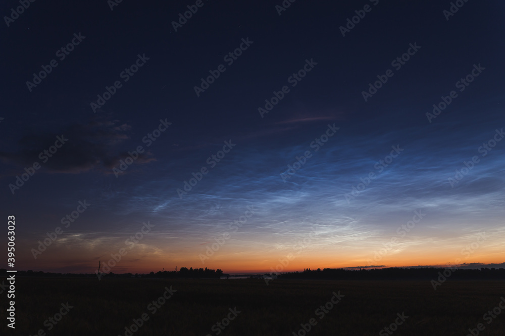 blue night sky with Noctilucent clouds night shining clouds