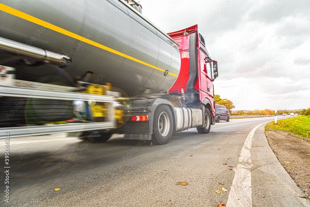 A big fuel tanker truck , on the roads of Europe . Logistics and transportation