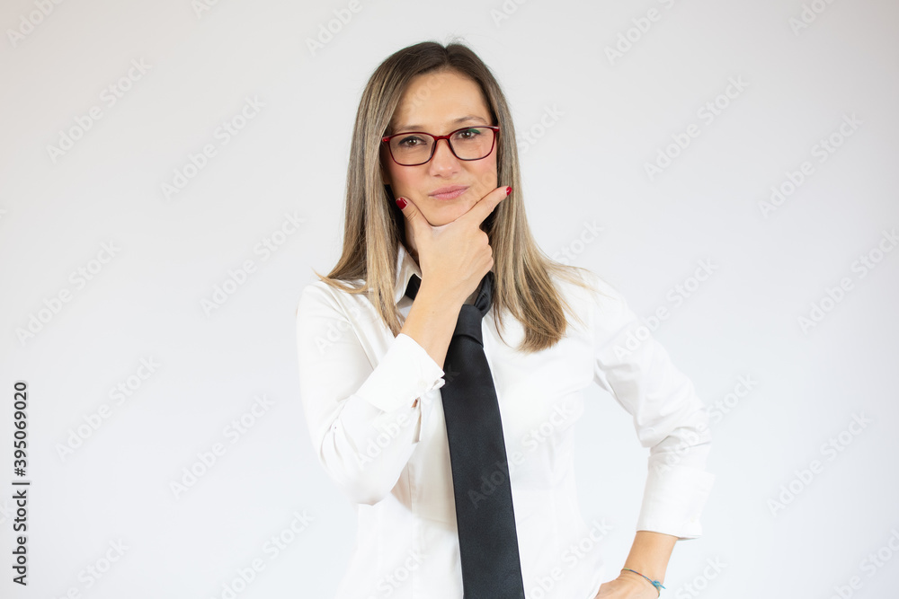 Business caucasian woman thinking on a white background Business caucasian woman thinking on a white background