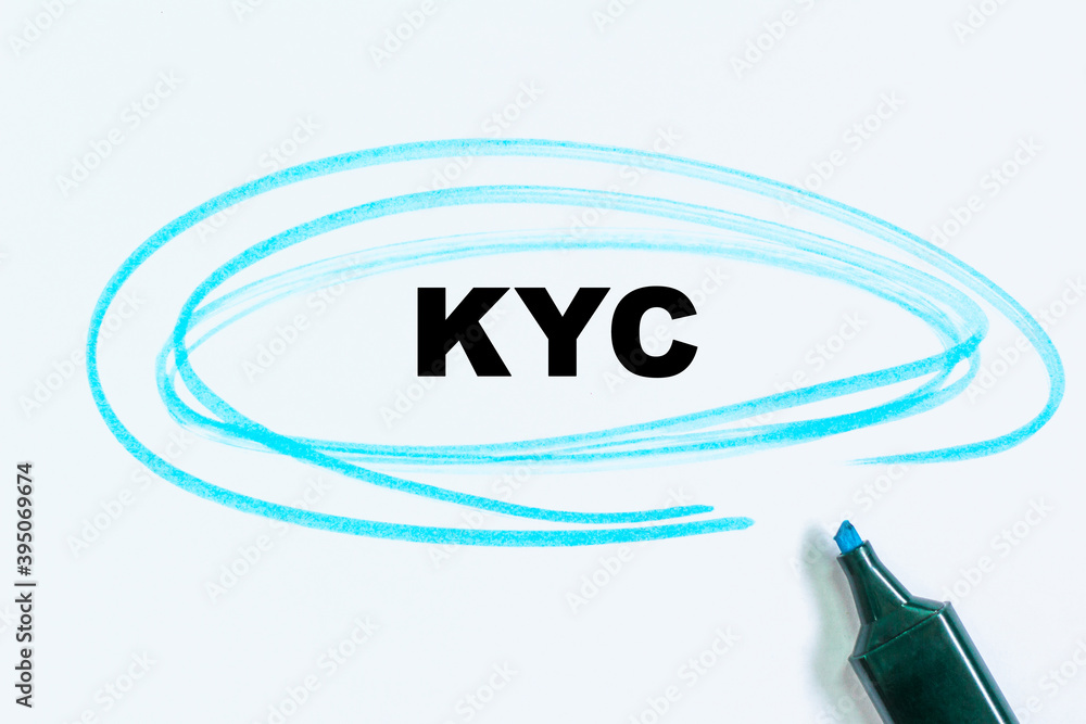 writing the text KYC. Check list and marker. Definition of the word