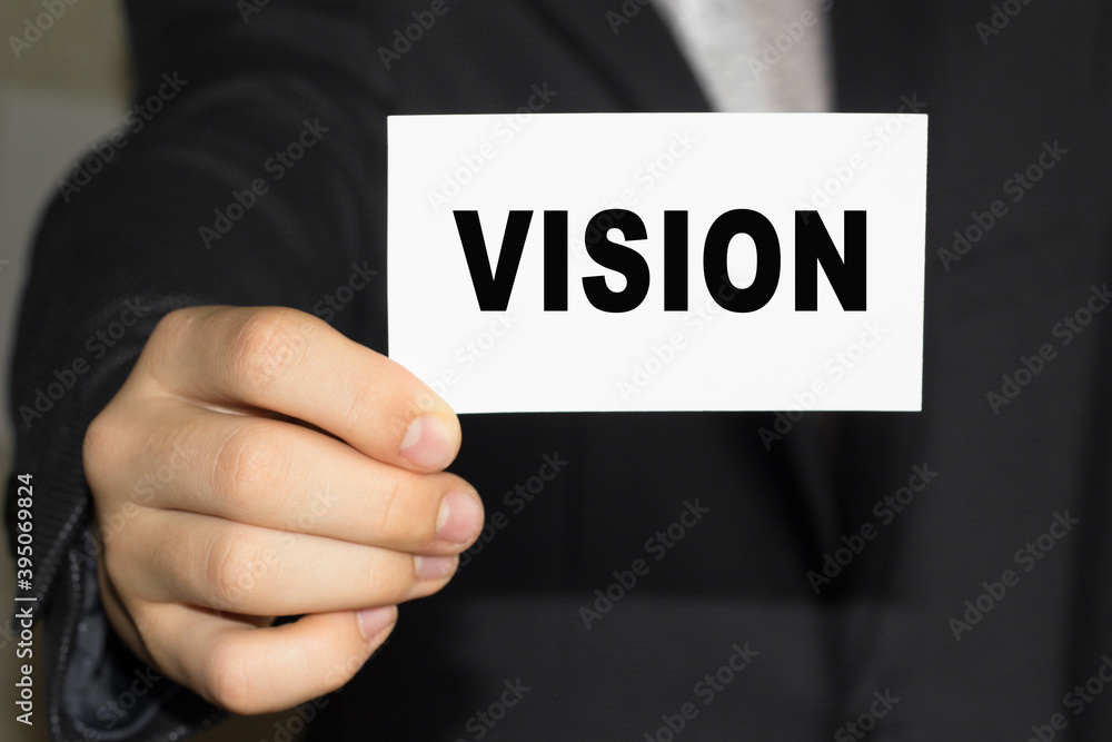 Card with text VISION on hand. You can use in business, marketing and other concepts. Messege of the day. Card with text VISION on hand. You can use in business, marketing and other concepts. Messege of the day.