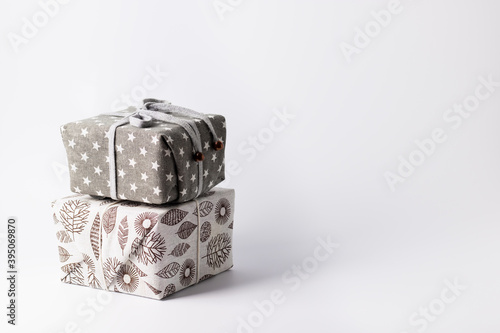 Quadro em tela Christmas zero waste, environmentally friendly packaging of gifts in fabrics with natural composition, the concept of an eco-friendly Christmas holiday, minimalism