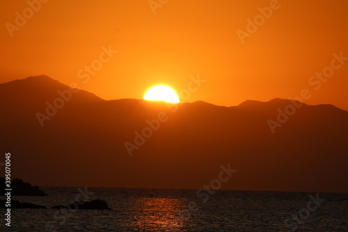 sunset over the sea © DIONYSIOS