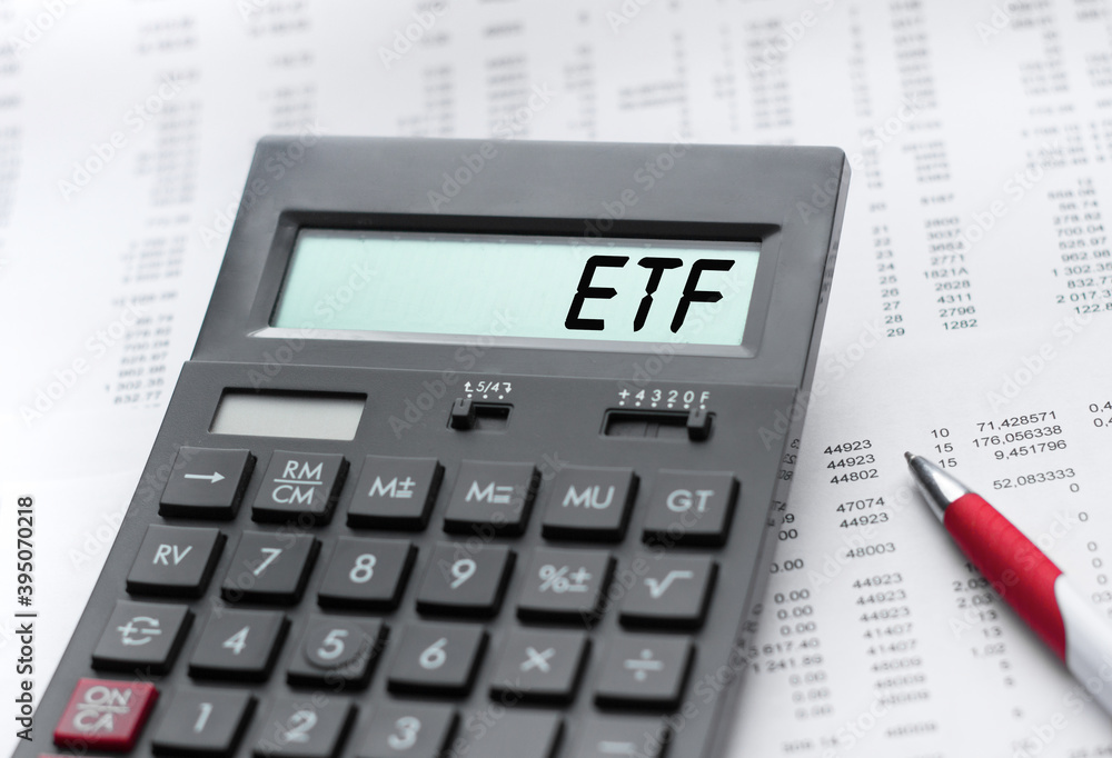 A calculator with the inscription ETF . Business profit concept A calculator with the inscription ETF . Business profit concept