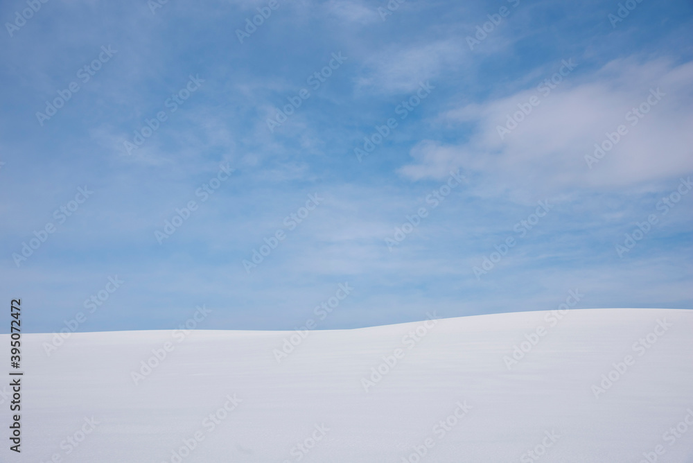 Blue sky on a snowy landscape