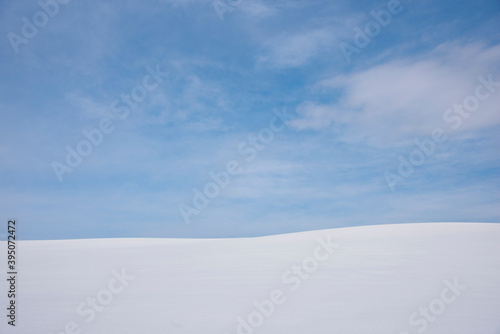 Blue sky on a snowy landscape © Courtney Victoria