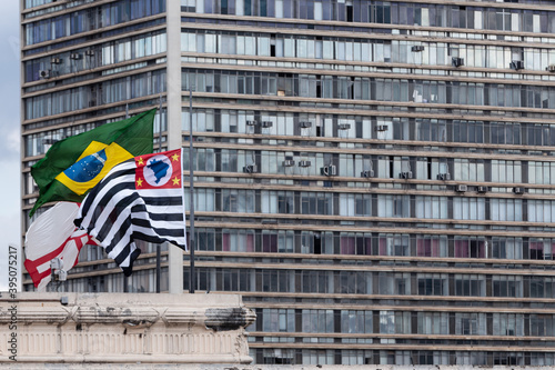 São Paulo and Brazil flag at building on São Paulo downtown.