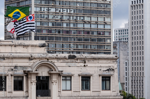 São Paulo and Brazil flag at building on São Paulo downtown.
