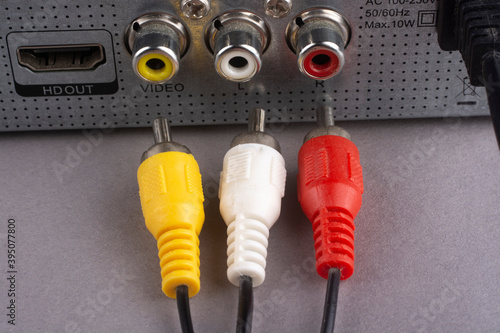 Yellow, white, red, RCA plug with black cable connect to audio and video. photo