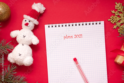 Christmas wish list, notepad on red background, to-do list, holiday mood