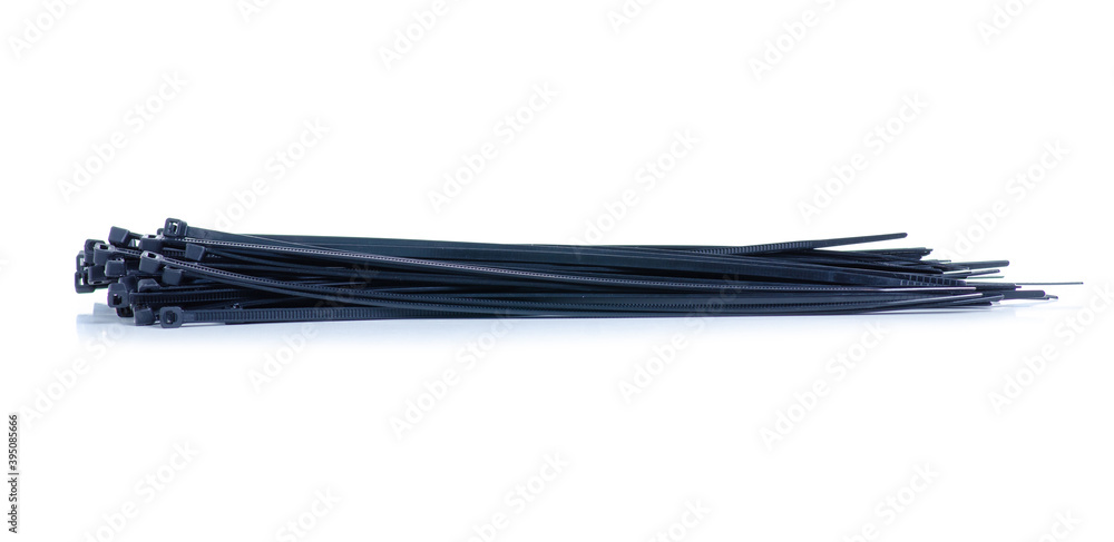 Black plastic ties clamps on white background isolation Black plastic ties clamps on white background isolation