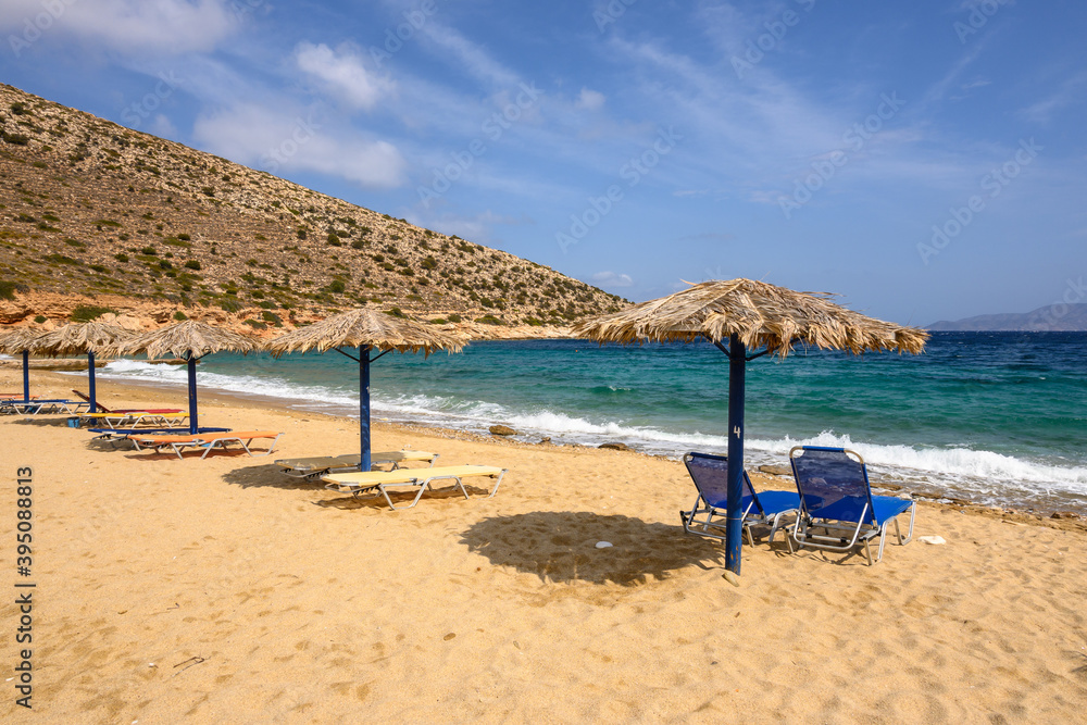 Fototapeta premium Agia Theodoti beach with golden sand and azure waters on Ios Island. Cyclades, Greece
