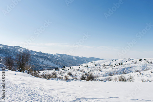 Snow on the Mountain Peaks on a clear Sunny winter day  Chimgan  Uzbekistan
