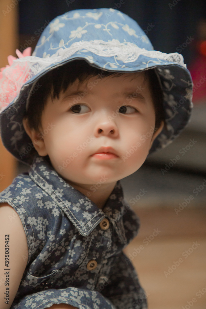 portrait of asian child posing on camera portrait of asian child posing on camera