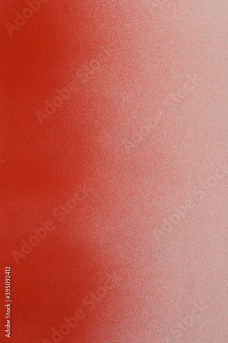spray paint red on white paper background