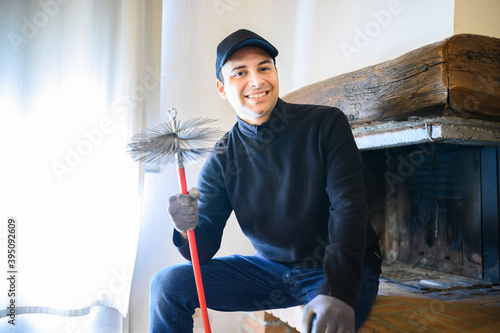 Obraz na plátně Young chimney sweep portrait in a house