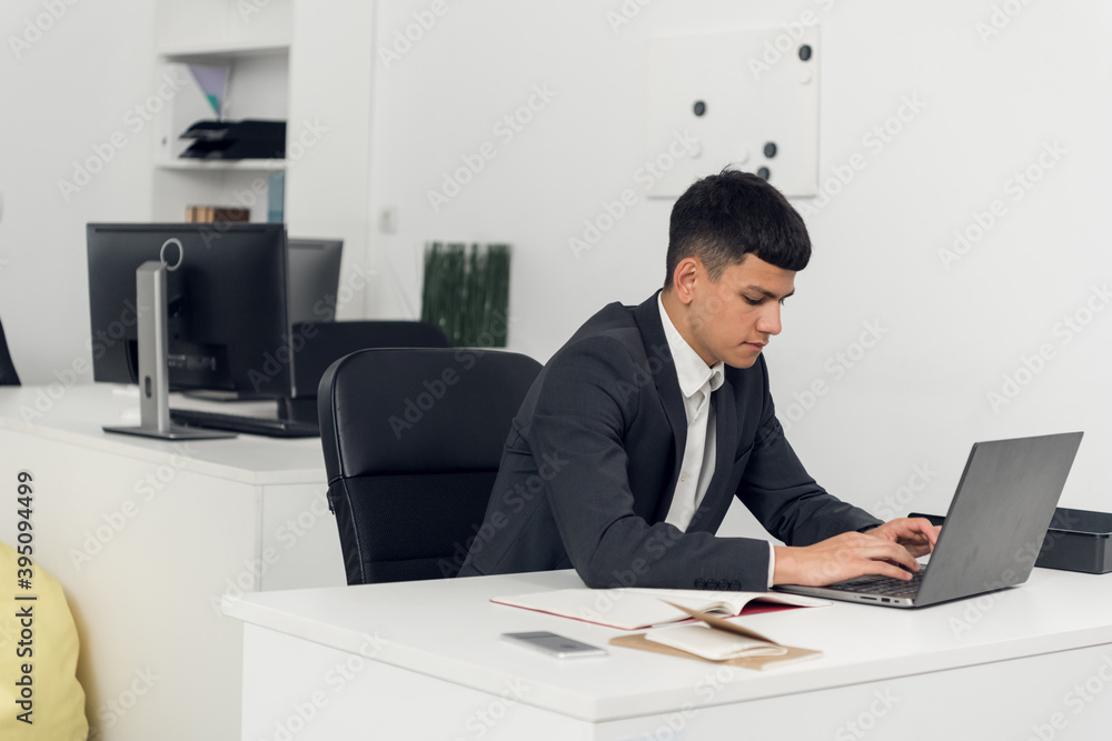 An employee of the LLC works with investment documents on the computer. Closing and opening trades on the basis of the graphs of sales An employee of the LLC works with investment documents on the computer. Closing and opening trades on the basis of the graphs of sales