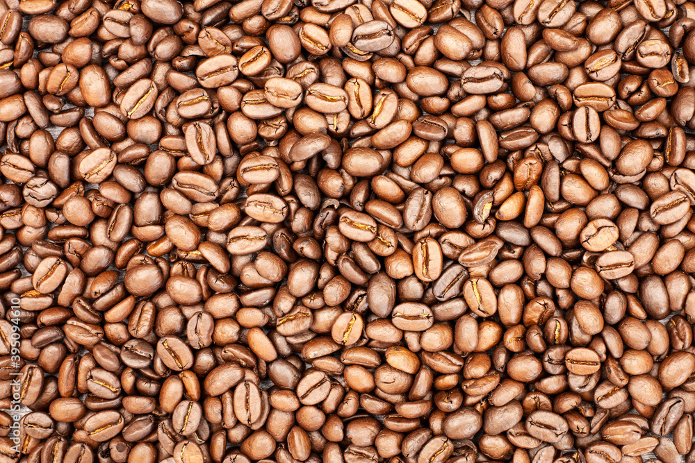 Freshly roasted coffee beans background Freshly roasted coffee beans background