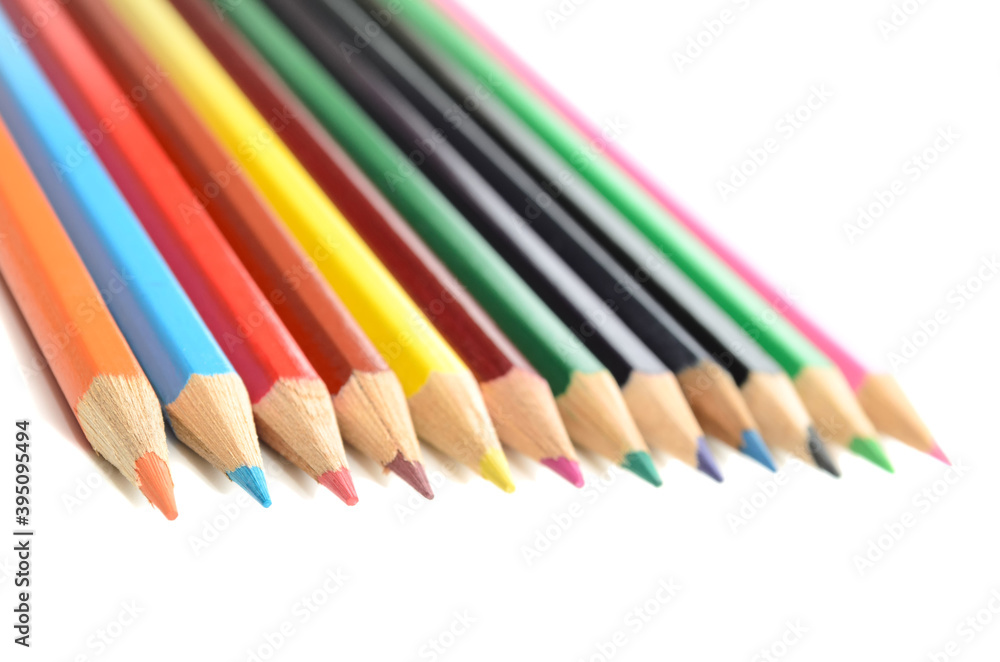A set of colored pencils on white background A set of colored pencils on white background