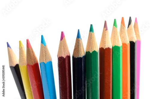 A set of colored pencils on white background