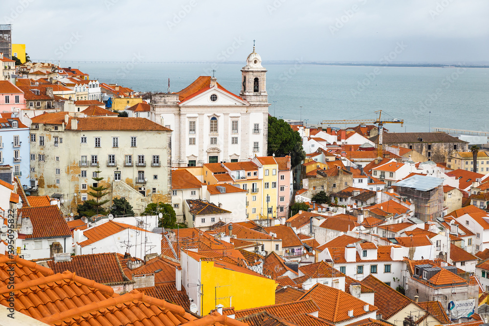 capital city of Portugal Lisbon Lisboa white building with orange red roofs view over the city