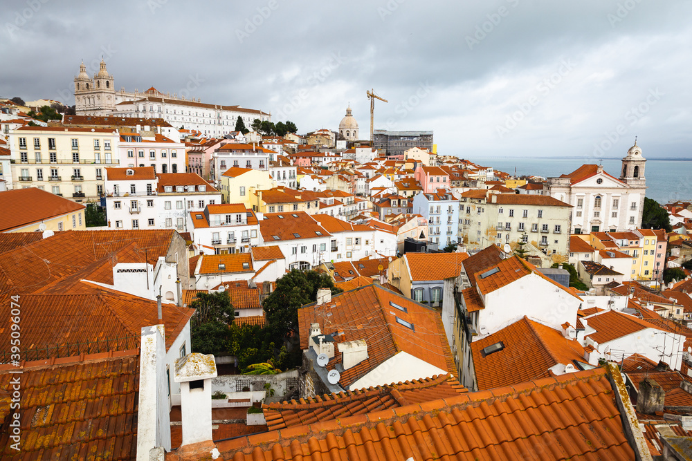 capital city of Portugal Lisbon Lisboa white building with orange red roofs