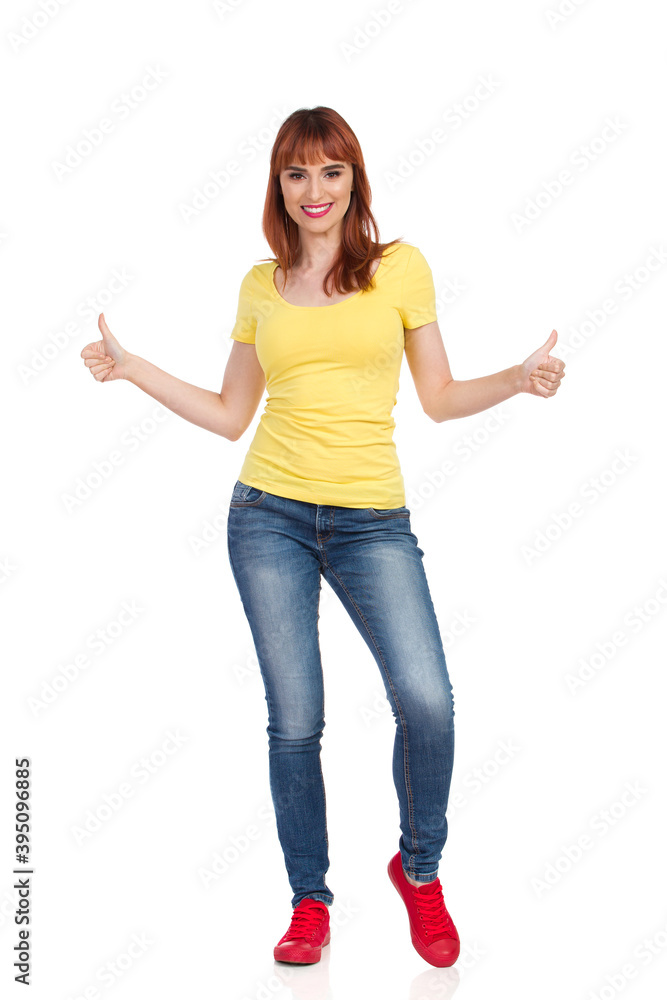 Confident Young Woman Is Showing Thumbs Up Confident Young Woman Is Showing Thumbs Up