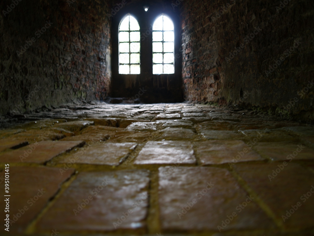 Obraz premium Light through Eeire castle windows