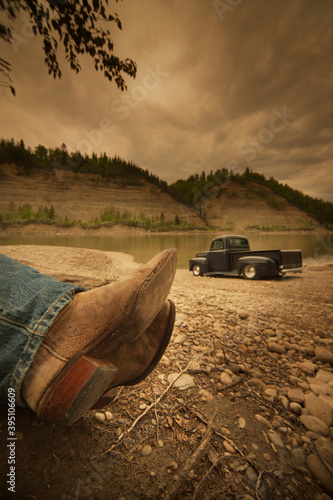 Cowboy boots and old truck