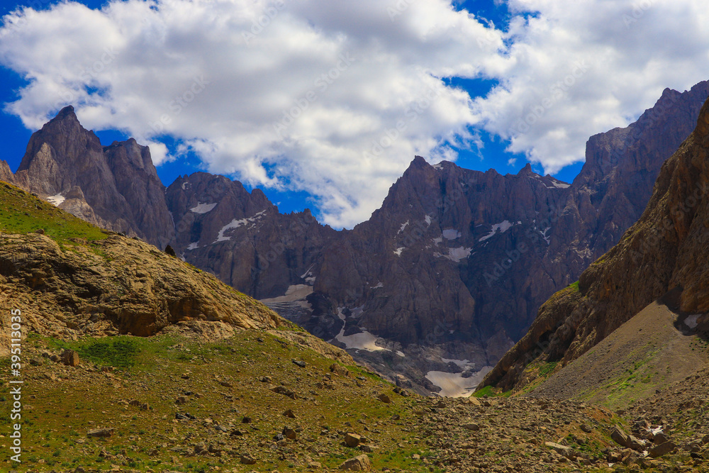 Fototapeta premium mountains and blue sky, white clouds, natural landscape 