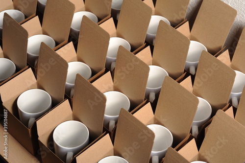  white mugs in craft cardboard boxes