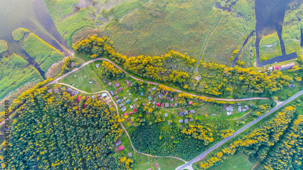 Fototapeta premium Small cottage settlement beautiful view from drone