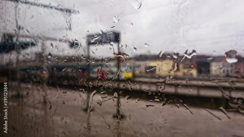 Rain drops on the window of a train on the station in Mechelen Belgium