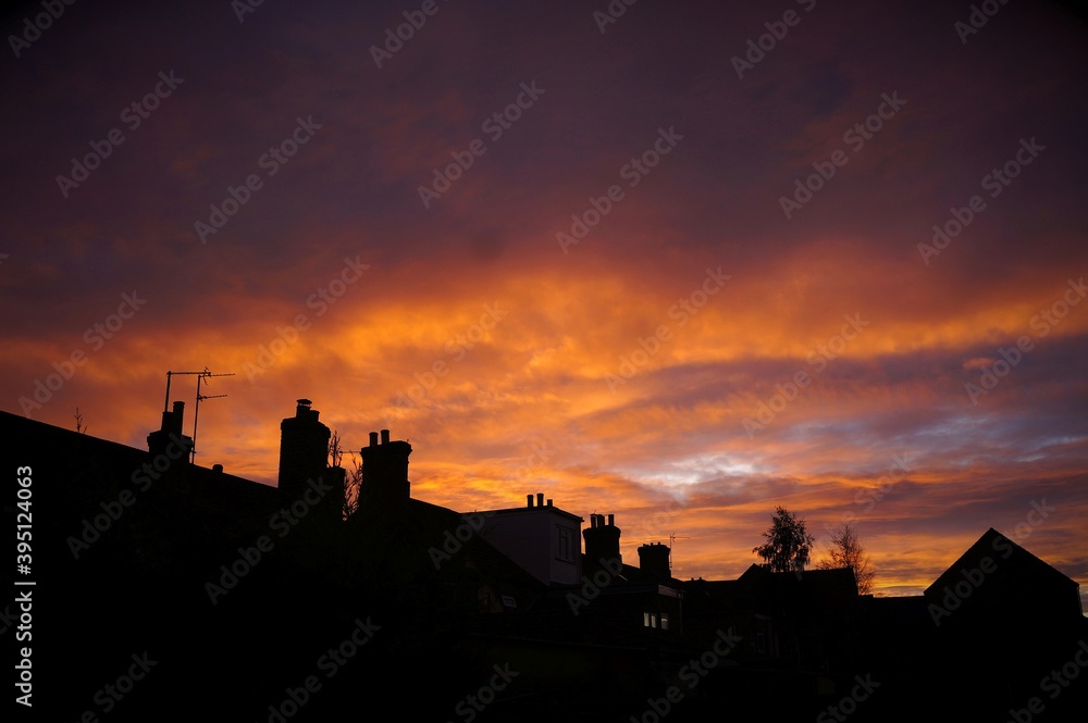 Orange cloud sunset over the rooftops