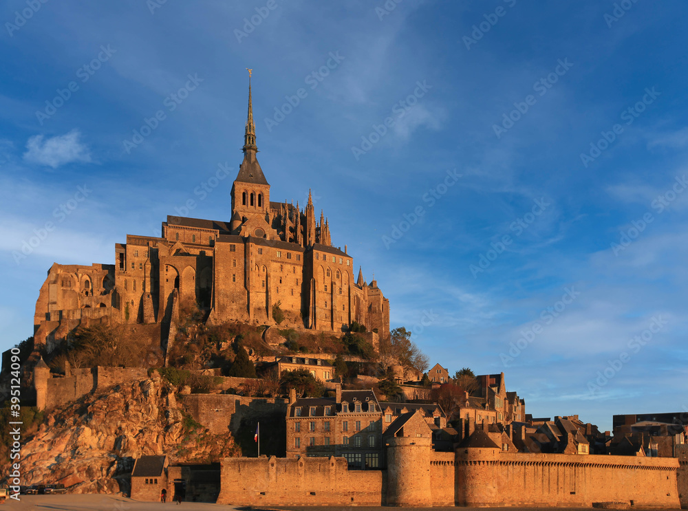 Morning light on Mont Saint Michel abbey in Normandy - France