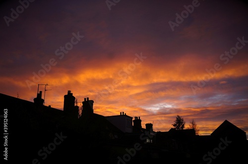 Orange cloud sunset over the rooftops
