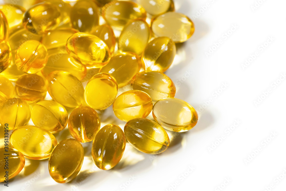 Capsules Omega 3 on white background. Copy space for your text. Top view, fish fat, Health care concept