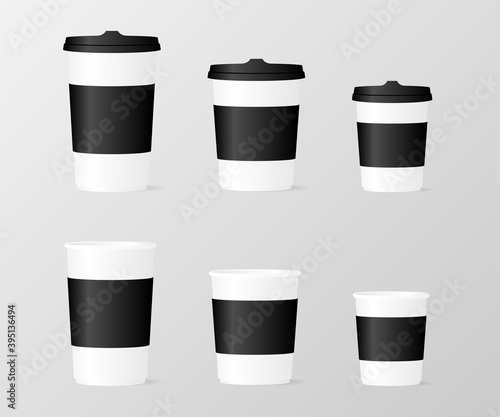 Close up take-out coffee with brown cap and cup holder.