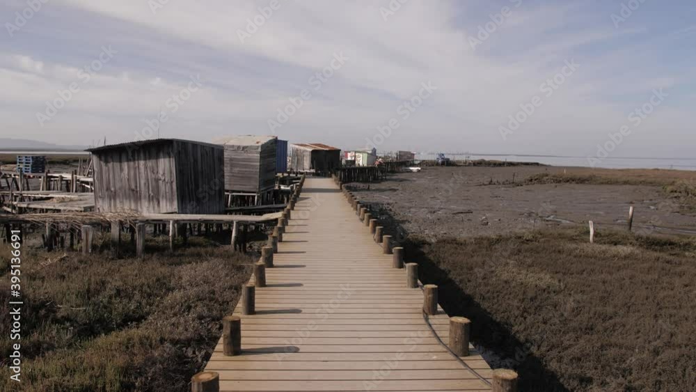walking in old wooden fishing port low tide carrasqueira portugal steady shot 4k walking in old wooden fishing port low tide carrasqueira portugal steady shot 4k