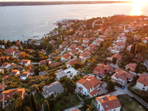 Fotografie aerial drone view village at seaside with red roofs
