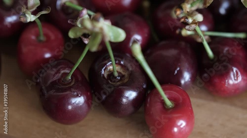 cherries on rustic table photo