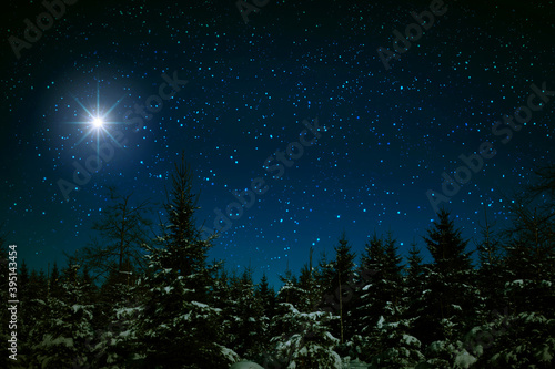 Christmas star on night abstract sky. Abstract Background.