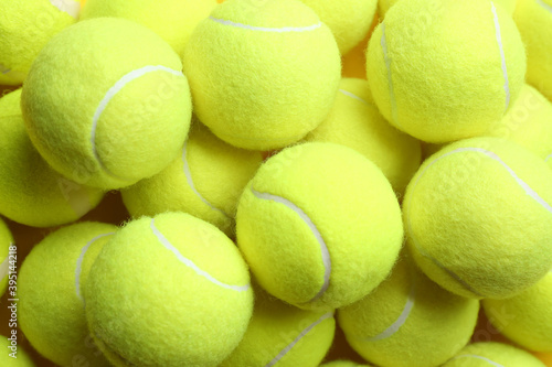 Bright tennis balls, top view. Sports equipment © New Africa
