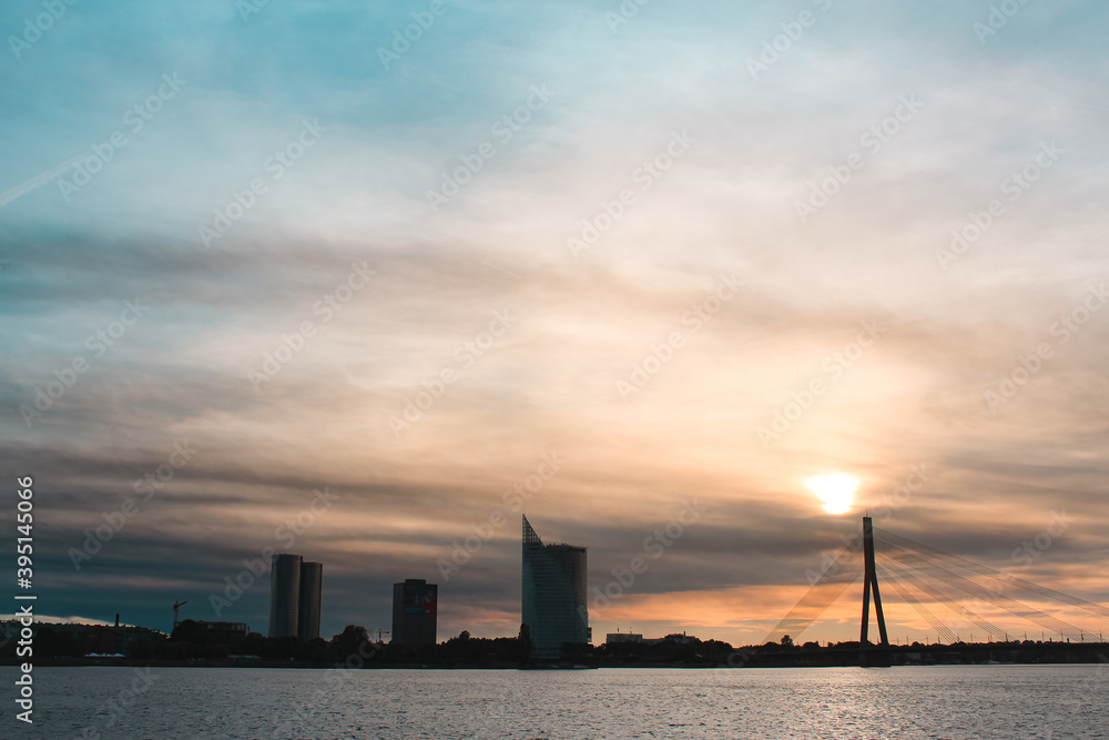 Sunset over bridge near city center of Riga, Latvia.