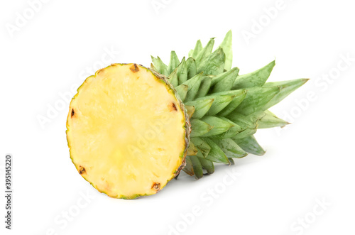 Cut fresh juicy pineapple on white background