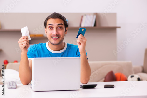 Принти на полотні Sport bet addicted young man betting at home