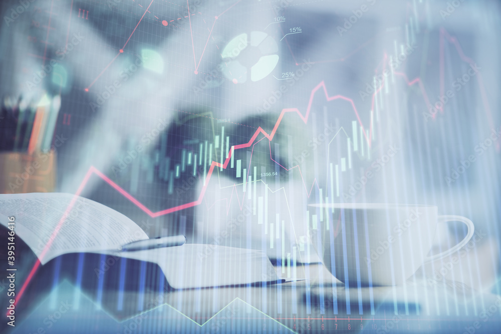 Multi exposure of forex graph drawing and desktop with coffee and items on table background. Concept of financial market trading Multi exposure of forex graph drawing and desktop with coffee and items on table background. Concept of financial market trading
