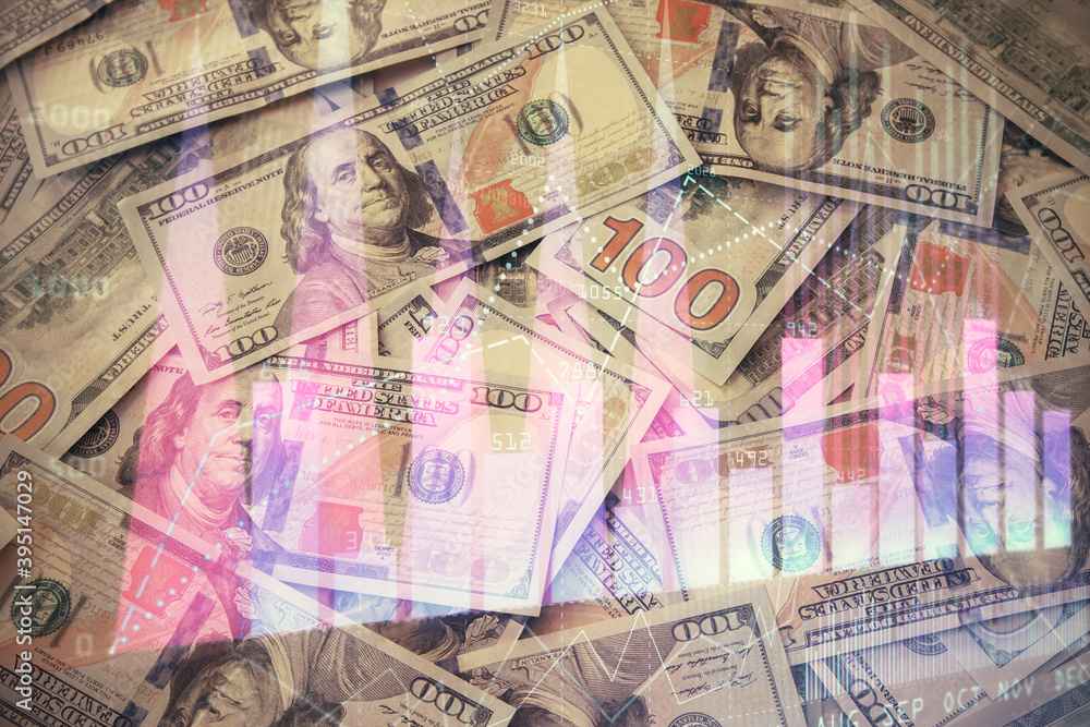 Multi exposure of forex chart drawing over us dollars bill background. Concept of financial success markets. Multi exposure of forex chart drawing over us dollars bill background. Concept of financial success markets.