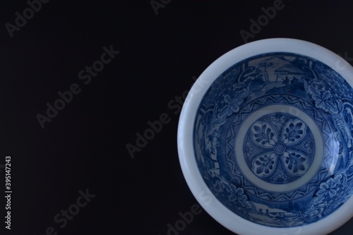 picture plate. This is a very fine example of Japanese traditional antique     imari ware    . black background soft focus image.